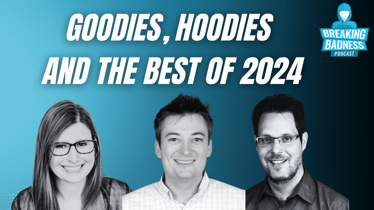 Three smiling people are featured in a promotional graphic for the "Breaking Badness" podcast. The text reads "Goodies, Hoodies, and the Best of 2024," hinting at DomainTools' 2025 Cybersecurity Predictions. The background is blue with the podcast logo in the top right corner.