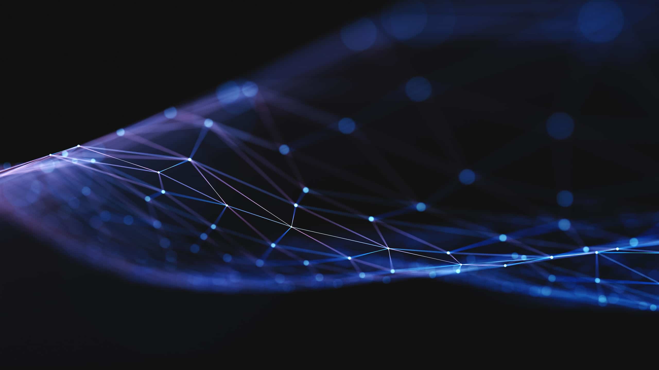 Abstract image of a network with glowing blue nodes connected by lines, creating a wave-like digital pattern on a dark background, suggesting advanced technology or data connectivity.
